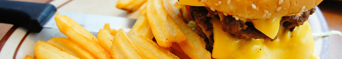 Eating American (Traditional) Burger at Country Drive-In restaurant in Clifton Park, NY.